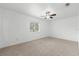 Bright bedroom with neutral carpeting and ceiling fan at 851 Marllo Rd, Kissimmee, FL 34744