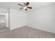 Comfortable bedroom with ceiling fan and large closet at 851 Marllo Rd, Kissimmee, FL 34744