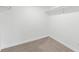 Large walk-in closet with neutral carpeting and shelving at 851 Marllo Rd, Kissimmee, FL 34744