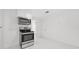 Bright kitchen with stainless steel range and microwave at 851 Marllo Rd, Kissimmee, FL 34744