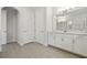 Bright bathroom boasts double vanity, walk-in shower, and tile floors at 8714 Sonoma Coast Dr, Winter Garden, FL 34787