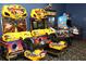Arcade games including racing and shooting games at 8956 California Palm Rd, Kissimmee, FL 34747
