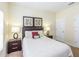 Guest bedroom with double bed and nightstands at 8956 California Palm Rd, Kissimmee, FL 34747