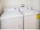 Stackable washer and dryer in the laundry room at 8956 California Palm Rd, Kissimmee, FL 34747
