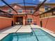Private screened-in pool and patio area at 8956 California Palm Rd, Kissimmee, FL 34747