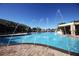 Refreshing pool with water features at 8956 California Palm Rd, Kissimmee, FL 34747