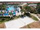 Sand volleyball court with surrounding community views at 8956 California Palm Rd, Kissimmee, FL 34747