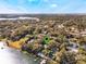 Aerial view showing home's location on the lake, near the neighborhood at 1115 Lake Nettie Dr Dr, Eustis, FL 32726