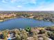 Aerial view showing home's location on the lake, close to nature at 1115 Lake Nettie Dr Dr, Eustis, FL 32726