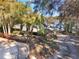 Stunning bird's eye view of a lakefront home on a wooded lot at 1115 Lake Nettie Dr Dr, Eustis, FL 32726