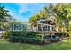 Charming ranch house with large deck and lake view at 1115 Lake Nettie Dr Dr, Eustis, FL 32726