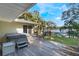 Spacious lakefront deck with hot tub and lake views at 1115 Lake Nettie Dr Dr, Eustis, FL 32726