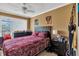 Main bedroom with double bed and access to a balcony at 122 Water Front Way # 370, Altamonte Springs, FL 32701