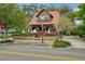 Charming wood exterior building with outdoor seating at 12795 Trovita Dr, Grand Island, FL 32735