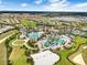 Community overview featuring pools, clubhouse and green spaces at 1445 Olympic Club Blvd, Champions Gate, FL 33896