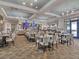 Community restaurant with seating and bar area at 1445 Olympic Club Blvd, Champions Gate, FL 33896