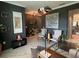 Elegant sitting area with modern decor and view to the kitchen at 1445 Olympic Club Blvd, Champions Gate, FL 33896