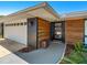 Modern entryway with wood and stone accents at 1509 Oxford Rd, Maitland, FL 32751