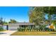 Updated mid-century modern home with landscaped yard and attached two-car garage at 1509 Oxford Rd, Maitland, FL 32751