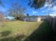 Spacious backyard with grassy area at 1606 Lime St, Kissimmee, FL 34746