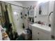 Bathroom featuring a shower/tub combo and vanity at 1606 Lime St, Kissimmee, FL 34746