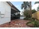 Brick patio leads to the fenced-in backyard with pool at 1710 Aster Dr, Winter Park, FL 32792