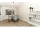 Charming dining area with a glass table and modern chandelier at 1710 Aster Dr, Winter Park, FL 32792