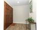 Bright entryway with hardwood floors and a console table at 1710 Aster Dr, Winter Park, FL 32792