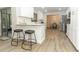 Modern kitchen with white shaker cabinets and quartz countertops at 1710 Aster Dr, Winter Park, FL 32792