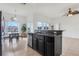 Eat-in kitchen with island, granite counters, and stainless steel appliances at 1826 Plantation Oak Dr, Orlando, FL 32824