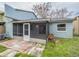 Screened patio with brick pavers and access to backyard at 2419 Rio Pinar Lakes Blvd, Orlando, FL 32822