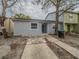 Newly renovated home with a spacious front yard and driveway at 2419 Rio Pinar Lakes Blvd, Orlando, FL 32822