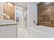 Modern bathroom with a soaking tub and walk-in shower at 2634 Sunrise Shores Dr, Kissimmee, FL 34747