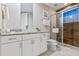 Modern bathroom with granite countertop and walk-in shower at 2634 Sunrise Shores Dr, Kissimmee, FL 34747