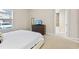 Comfortable bedroom with a queen-size bed and en-suite bathroom at 2634 Sunrise Shores Dr, Kissimmee, FL 34747