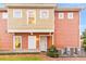 Two-story home with light peach and beige siding at 2634 Sunrise Shores Dr, Kissimmee, FL 34747