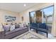 Spacious living room with large windows and comfortable seating at 2634 Sunrise Shores Dr, Kissimmee, FL 34747