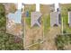 Aerial view of homes with solar panels and large yards at 2649 Howland Blvd, Deltona, FL 32738