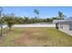 Large backyard with a basketball hoop and shed at 2649 Howland Blvd, Deltona, FL 32738