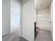 Clean bathroom with a bathtub, toilet and dark vanity at 2649 Howland Blvd, Deltona, FL 32738