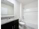 Clean bathroom with granite countertop and tub at 2649 Howland Blvd, Deltona, FL 32738