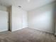 Simple bedroom with carpet flooring and neutral walls at 2649 Howland Blvd, Deltona, FL 32738