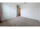 Spacious bedroom with neutral walls and carpeting at 2649 Howland Blvd, Deltona, FL 32738