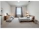 Spacious bedroom with wood furniture and neutral decor at 2649 Howland Blvd, Deltona, FL 32738