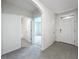 Hallway with doors to bedrooms and bathroom at 2649 Howland Blvd, Deltona, FL 32738