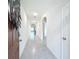 Bright hallway with tile floors and archways at 2649 Howland Blvd, Deltona, FL 32738