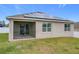 House exterior with screened porch and solar panels at 2649 Howland Blvd, Deltona, FL 32738