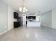 Open concept kitchen with island and breakfast bar area at 2649 Howland Blvd, Deltona, FL 32738