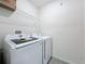 Functional laundry room with Samsung washer and dryer at 2649 Howland Blvd, Deltona, FL 32738
