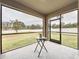 Spacious screened porch overlooking backyard at 2649 Howland Blvd, Deltona, FL 32738